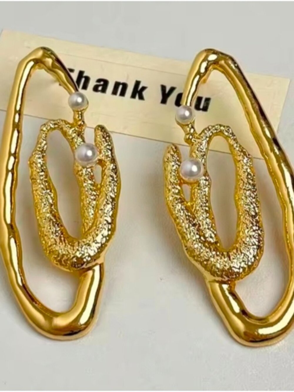 Gold tone Textured Loop Earrings with Pearl Accents